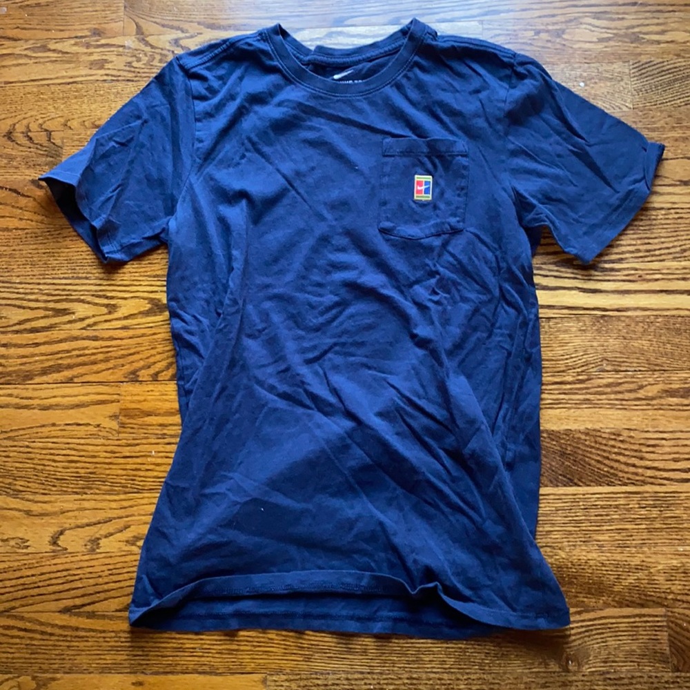 Nike Heritage Court Logo Pocket T-Shirt.